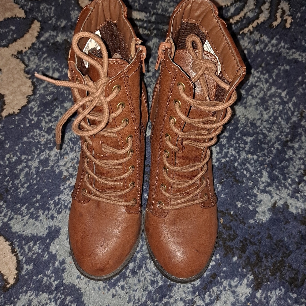 Brown heeled combat booties